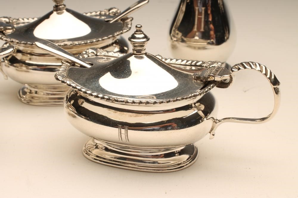 A SILVER COMPOSITE SIX PIECE CRUET Image