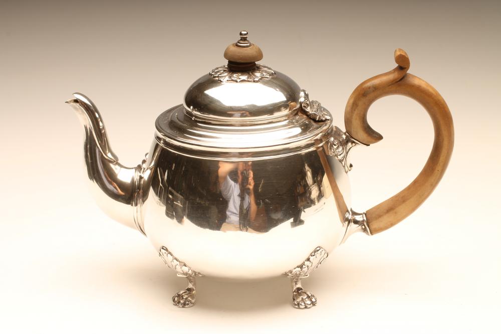 A SILVER TEAPOT Image