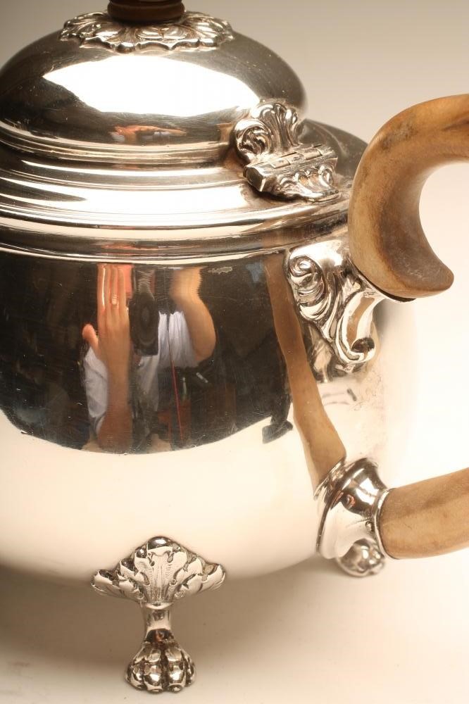 A SILVER TEAPOT Image
