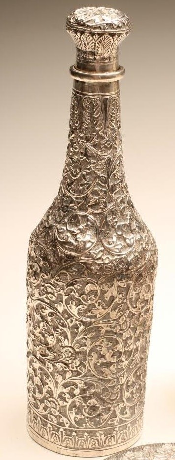 A PAIR OF INDONESIAN SILVER NOVELTY PEPPERETTES Image