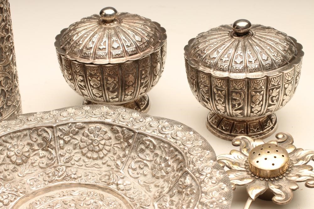 A PAIR OF INDONESIAN SILVER NOVELTY PEPPERETTES Image