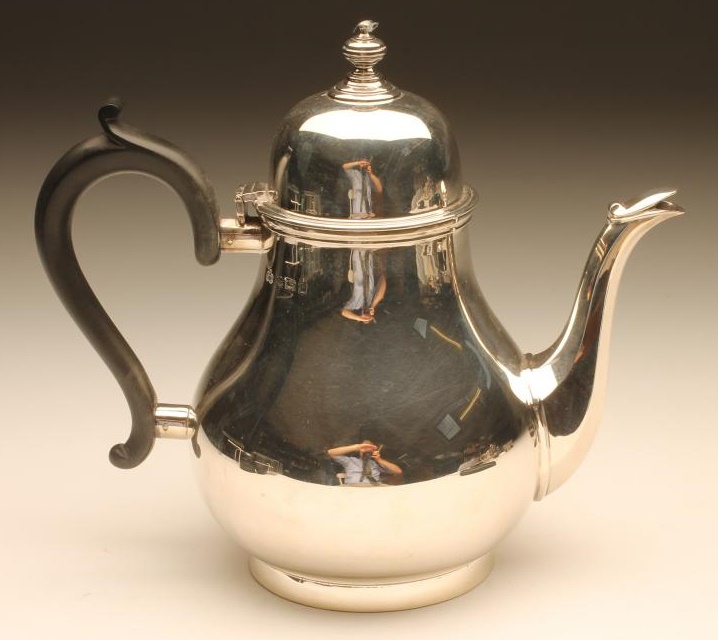 A SILVER TEAPOT Image