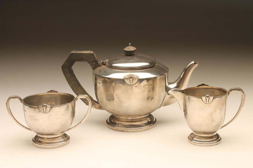 AN ART DECO SILVER THREE PIECE TEA SERVICE Image