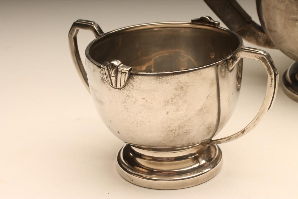 AN ART DECO SILVER THREE PIECE TEA SERVICE Image