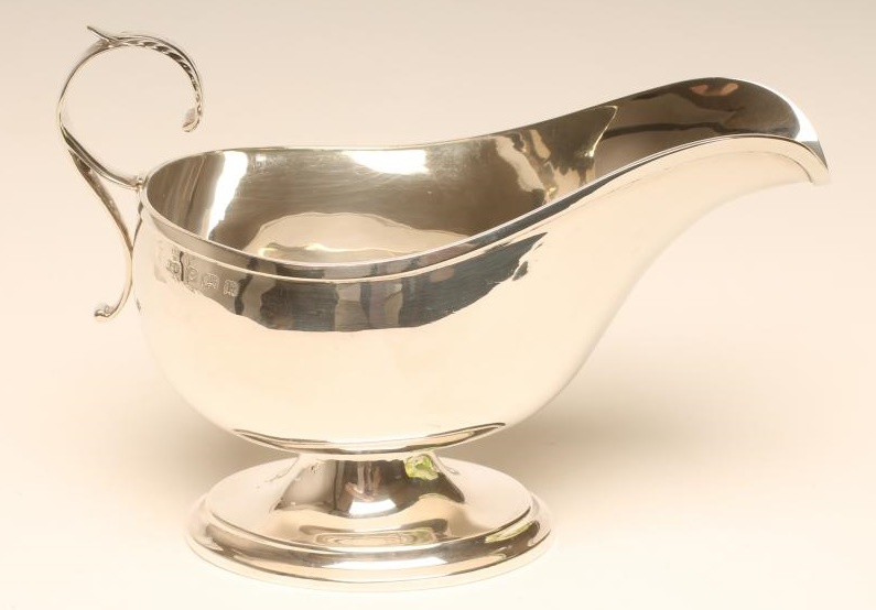 A SILVER SAUCEBOAT Image
