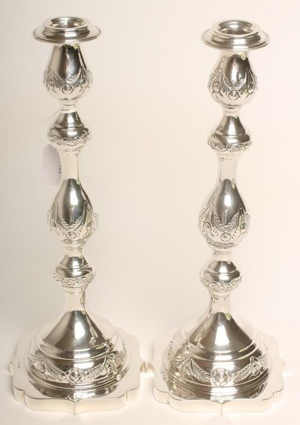 A PAIR OF SILVER SHABBAT CANDLESTICKS Image
