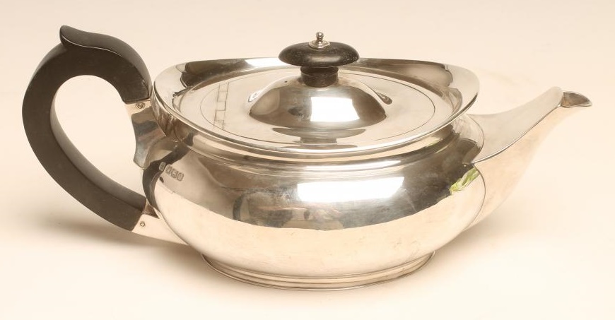 A BACHELOR'S SILVER TEAPOT Image