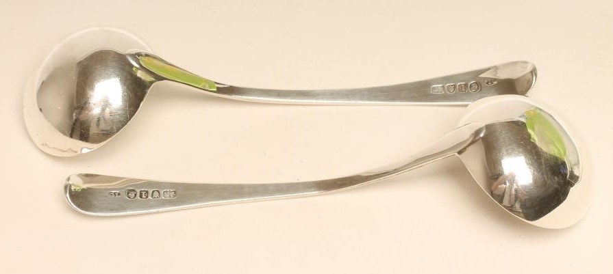 A PAIR OF GEORGE III SILVER SAUCE LADLES Image