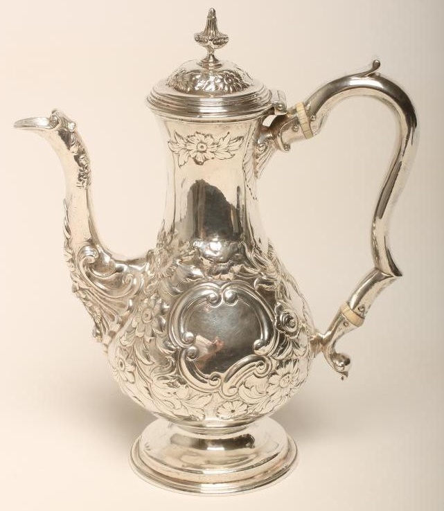 A GEORGE I SILVER HOT WATER JUG Image