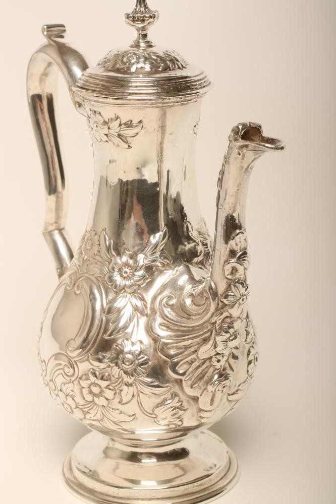 A GEORGE I SILVER HOT WATER JUG Image
