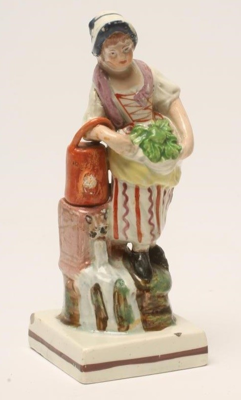 A PEARLWARE FIGURE Image