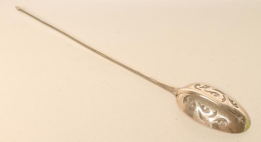 A GEORGE II SILVER MOTE SPOON Image