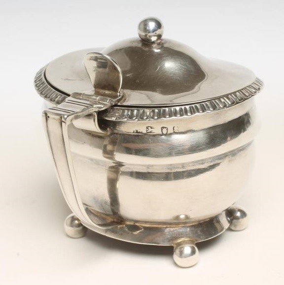 A LATE GEORGE III SILVER MUSTARD Image