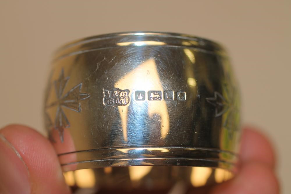 A PAIR OF VICTORIAN SILVER NAPKIN RINGS Image