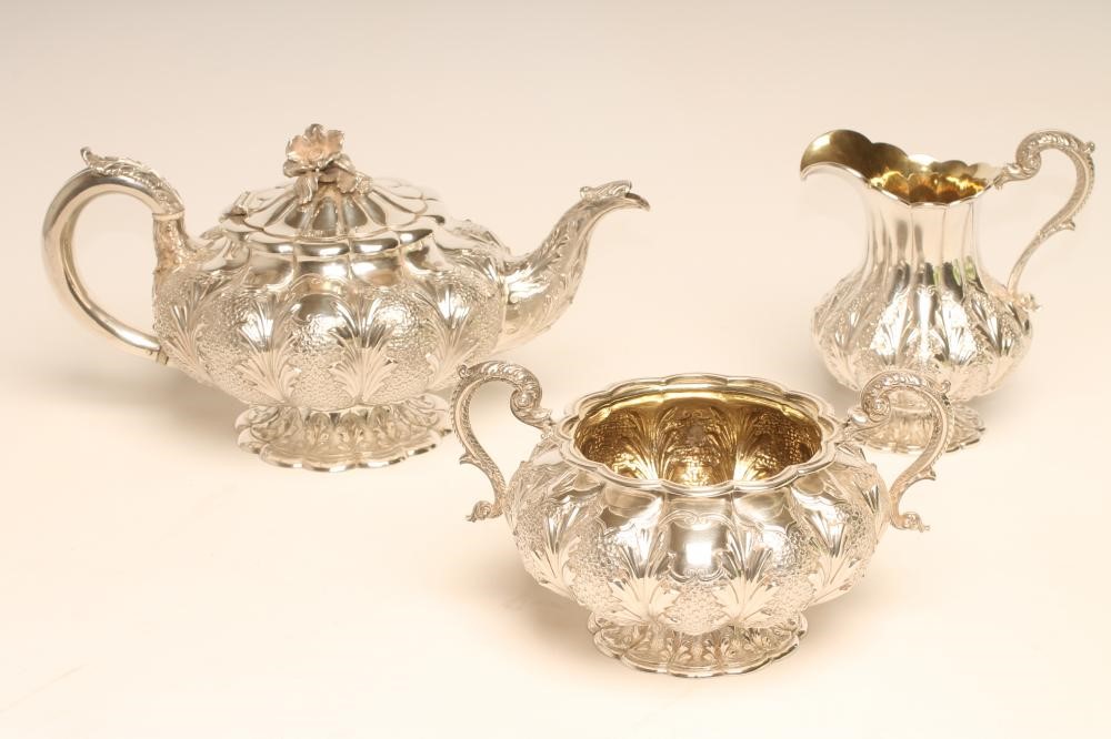 A WILLIAM IV SILVER THREE PIECE TEA SERVICE Image