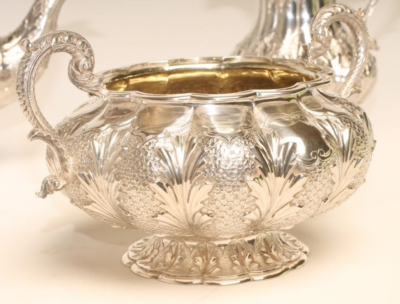 A WILLIAM IV SILVER THREE PIECE TEA SERVICE Image