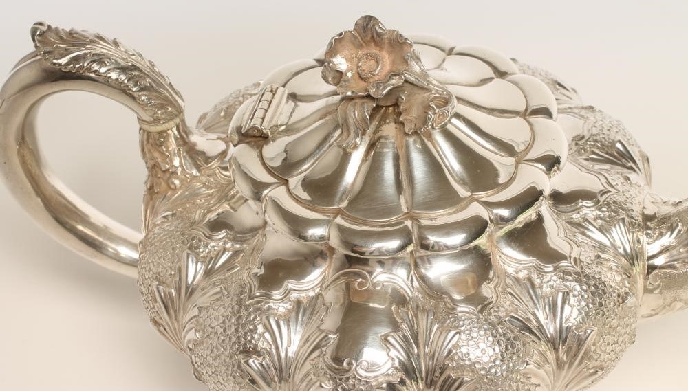 A WILLIAM IV SILVER THREE PIECE TEA SERVICE Image