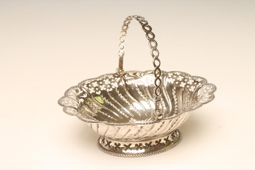 A GEORGE III SILVER EPERGNE BASKET Image