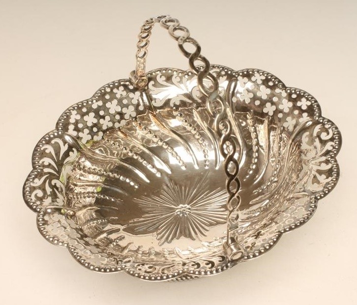 A GEORGE III SILVER EPERGNE BASKET Image