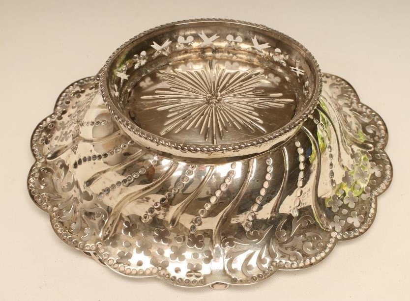 A GEORGE III SILVER EPERGNE BASKET Image