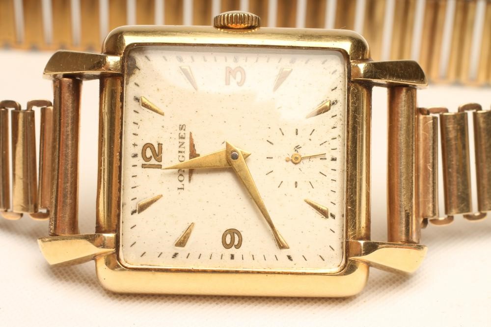 OF FILM INTEREST - HERBERT S. MARSHALL - a gentleman's 18ct gold Longines wristwatch Image