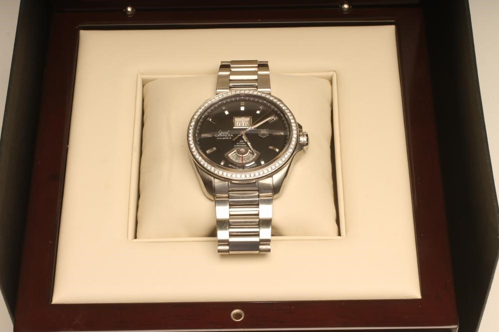 A GENTLEMAN'S TAG HEUER "CARRERA" STAINLESS STEEL AUTOMATIC GMT CHRONOMETER Image