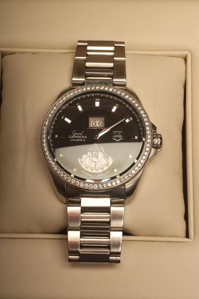 A GENTLEMAN'S TAG HEUER "CARRERA" STAINLESS STEEL AUTOMATIC GMT CHRONOMETER Image