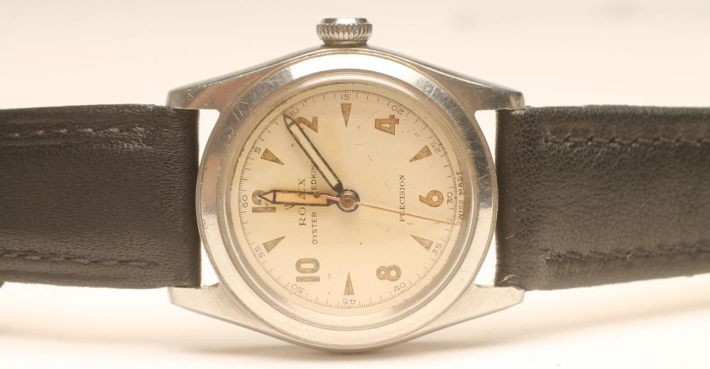 A MID SIZE STAINLESS STEEL ROLEX OYSTER SPEEDKING WRISTWATCH Image