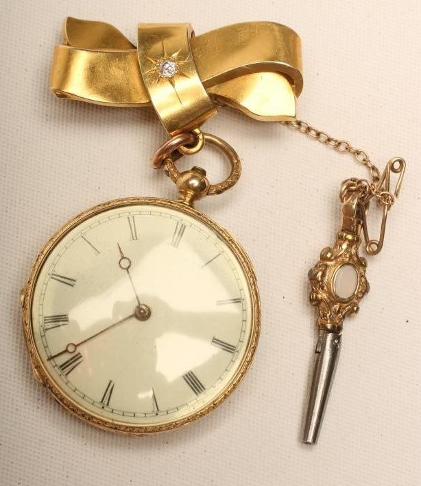 A LADY'S GOLD FOB WATCH Image