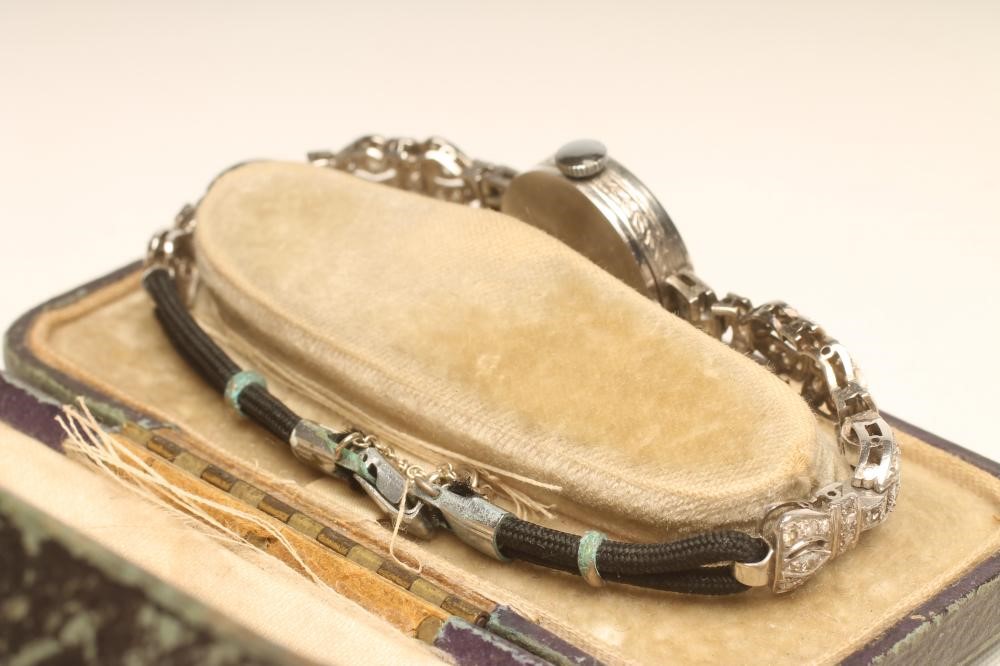 A LADY'S ART DECO DIAMOND COCKTAIL WATCH Image