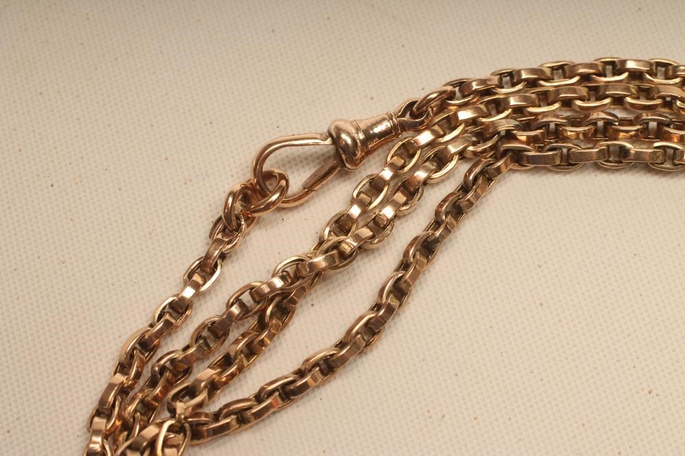 A 9CT GOLD GUARD CHAIN Image
