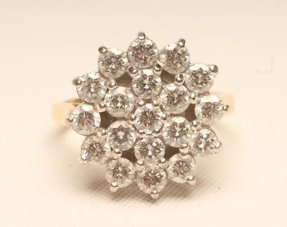 A DIAMOND CLUSTER RING Image