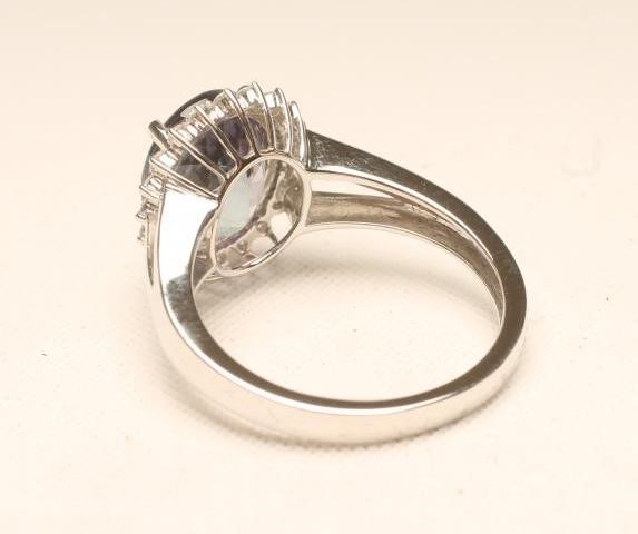 A TANZANITE AND DIAMOND RING Image