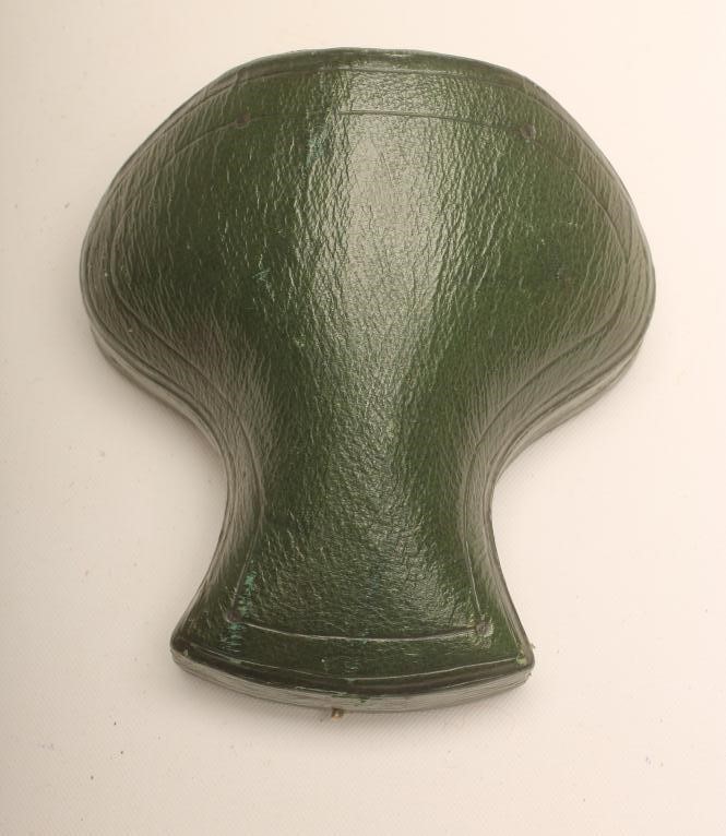 A VICTORIAN INDIANESQUE BROOCH formed as two crescents enclosing a melon lobed dome each centred by Image