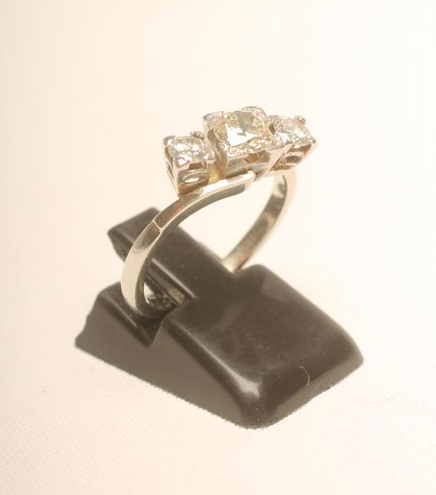 A THREE STONE DIAMOND RING Image