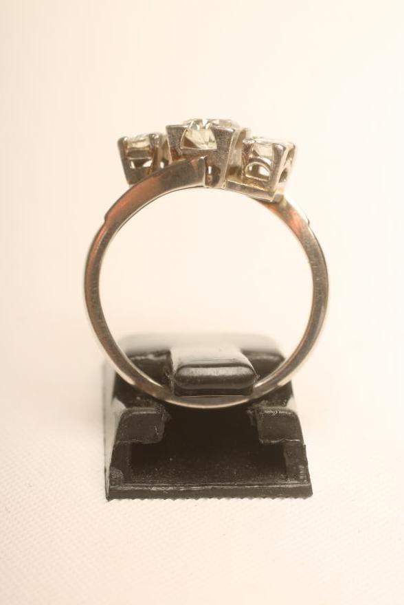 A THREE STONE DIAMOND RING Image