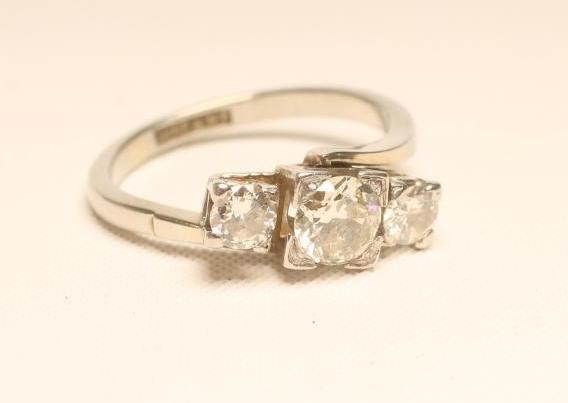 A THREE STONE DIAMOND RING Image
