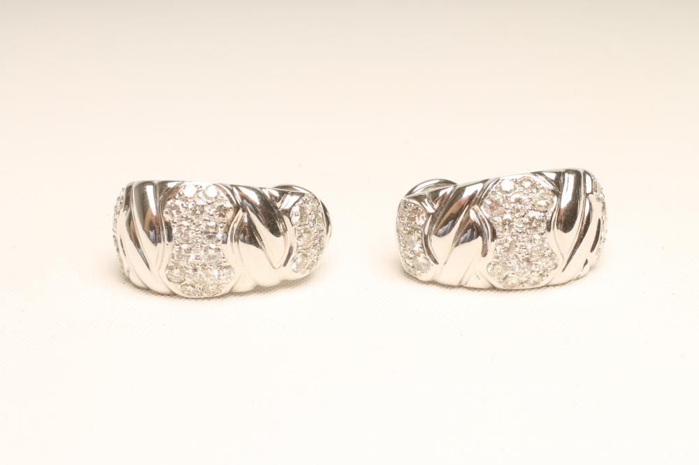 A PAIR OF DIAMOND EARRINGS Image