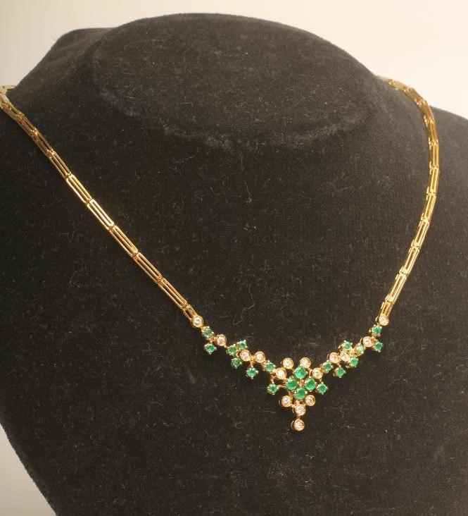 AN EMERALD AND DIAMOND NECKLACE Image