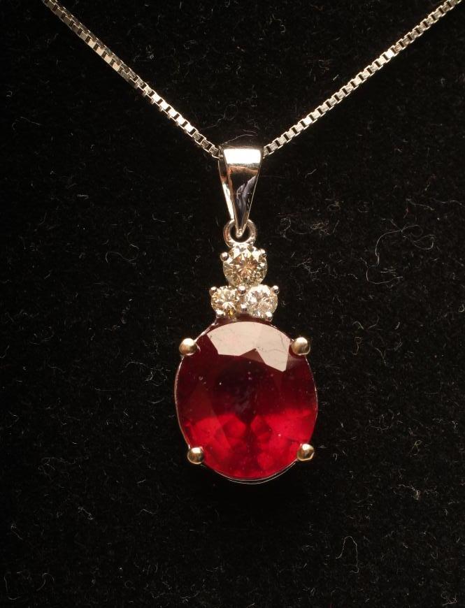 A RUBY AND DIAMOND PENDANT Image