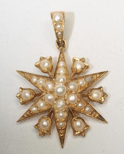 A VICTORIAN 18CT GOLD AND PEARL STAR PENDANT Image