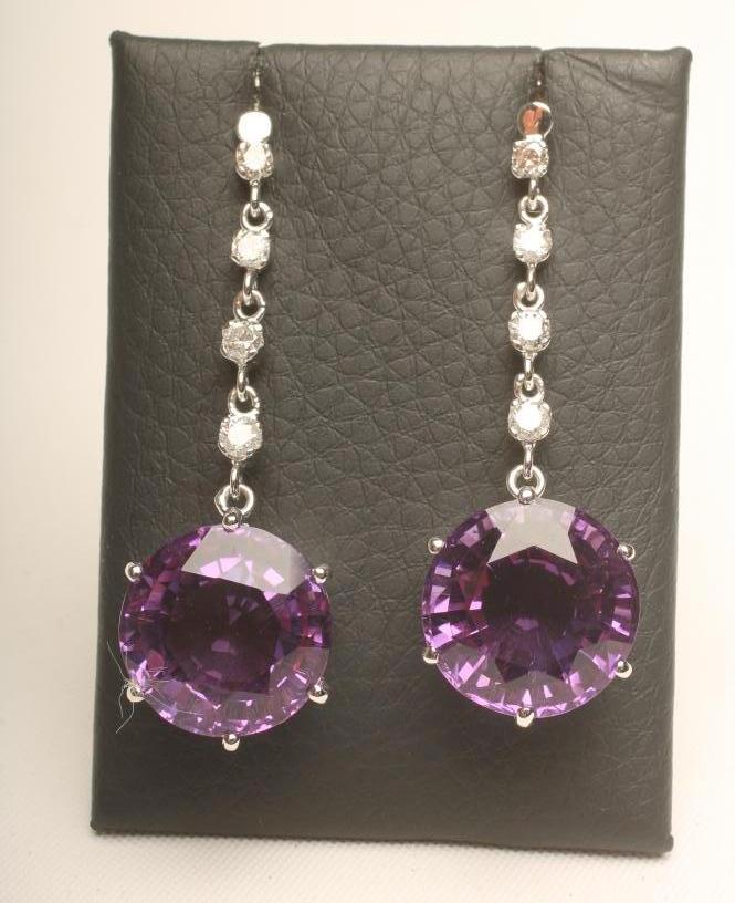 A PAIR OF AMETHYST AND DIAMOND DROP EAR STUDS Image