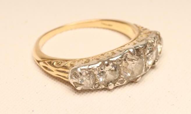 A FIVE STONE DIAMOND RING Image