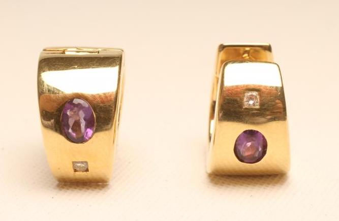 A PAIR OF AMETHYST AND DIAMOND CUFF EAR STUDS Image
