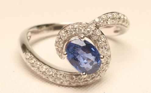 A SAPPHIRE AND DIAMOND DRESS RING Image