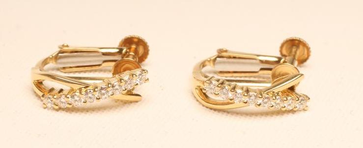 A PAIR OF DIAMOND EARRINGS Image