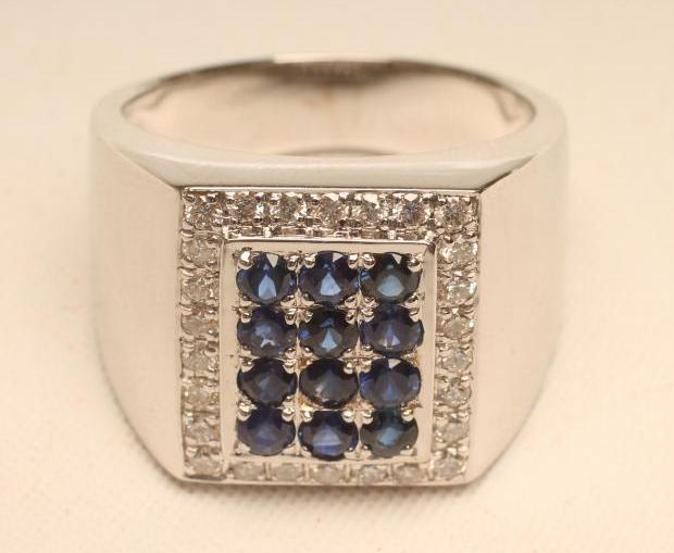 A GENTLEMAN'S SAPPHIRE AND DIAMOND RING Image