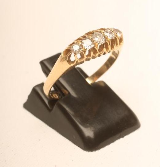 A FIVE STONE DIAMOND RING Image