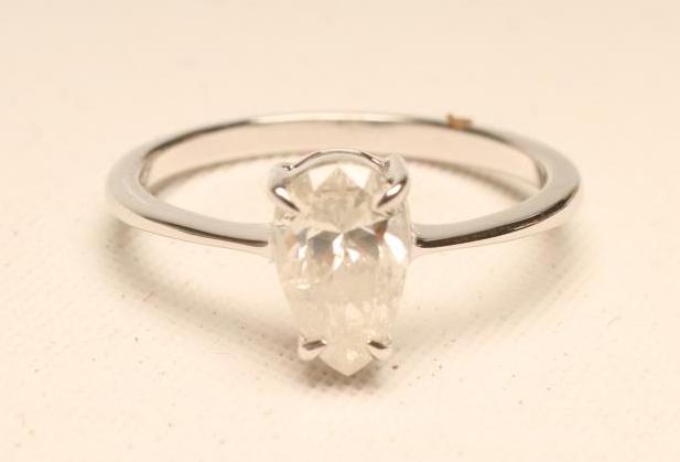 A SOLITAIRE DIAMOND RING Image