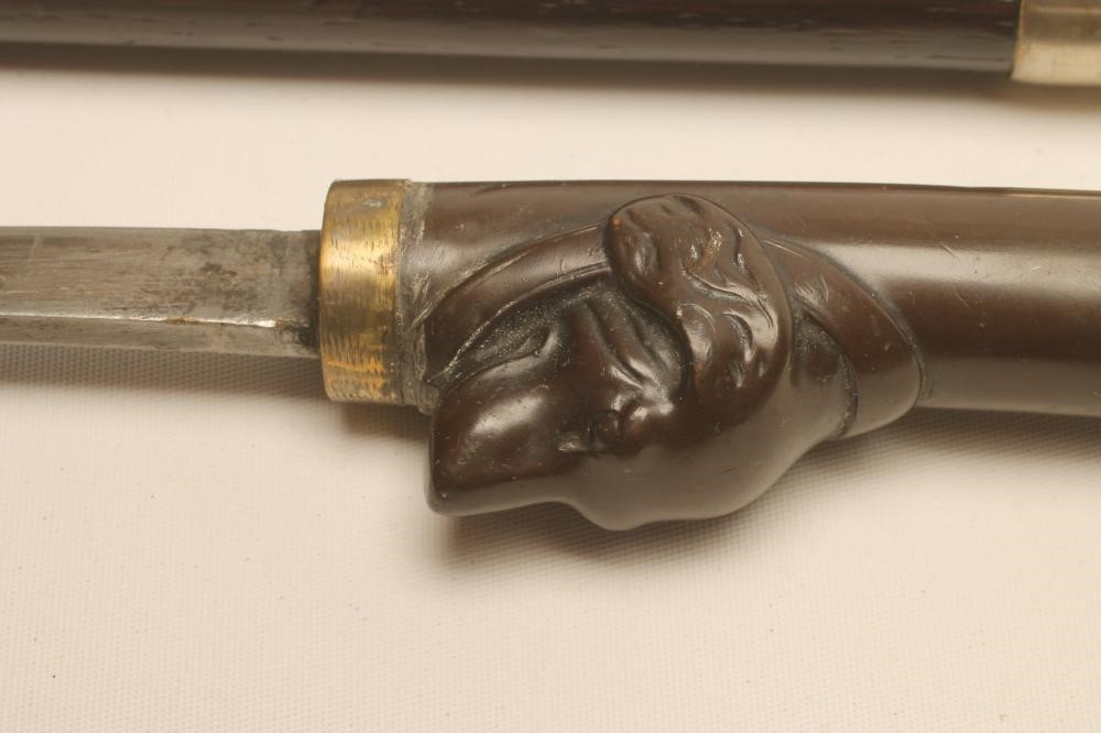 A SWORD CANE Image